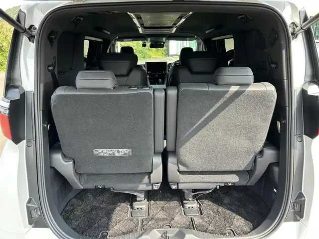 トヨタ アルファードハイブリット Z 鹿児島県 2024(令6)年 2.3万km プラチナホワイトパールマイカ 純正フリップダウンモニター/純正メモリナビ/　　CD/DVD/BT/フルセグ/アラウンドビューモニター/両側パワースライドドア/LEDヘッドライト/レザーシート/純正18インチアルミホイール/純正ビルトインETC2.0/オットマン/電動リアゲート/社外ドライブレコーダー