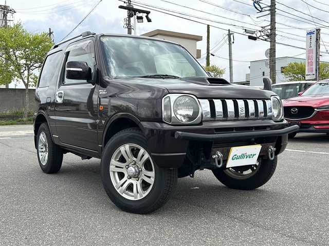スズキ ジムニー ワイルドウィンド 石川県 2008(平20)年 12.8万km トワイライトパープルパール 4WD/ターボ/社外メモリナビゲーション/【CD・DVD・SD・フルセグTV】/型番：MDV-L502/前席シートヒーター/リモコンキー/・キーレス/ETC/電動格納ミラー/・ウィンカーミラー/皮調シート/フロントバンパーガード/純正フロアマット/純正AW16インチ/取扱説明書/保証書