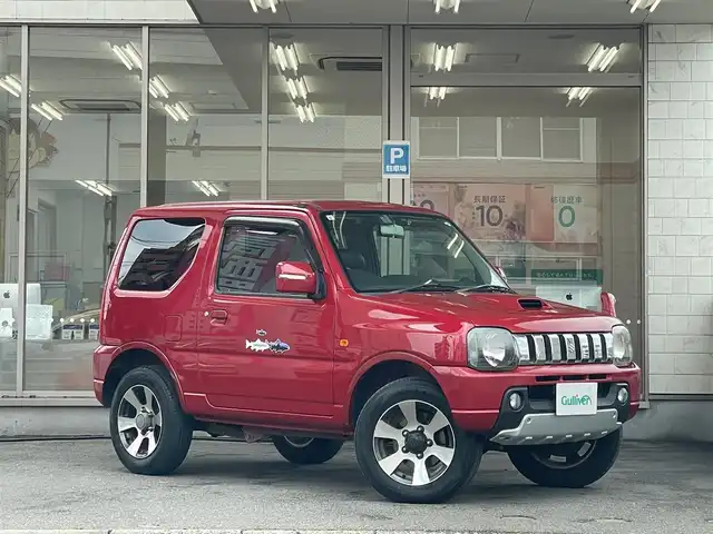 スズキ ジムニー クロスアドベンチャー XC 愛知県 2011(平23)年 15.3万km フェニックスレッドパール /当店買取/禁煙/1オーナー//社外ナビ/地デジ/CD//ETC//専用ハーフレザー/専用グリル//シートヒーター//タイヤハードケース//保証書/取説/キーレスキー