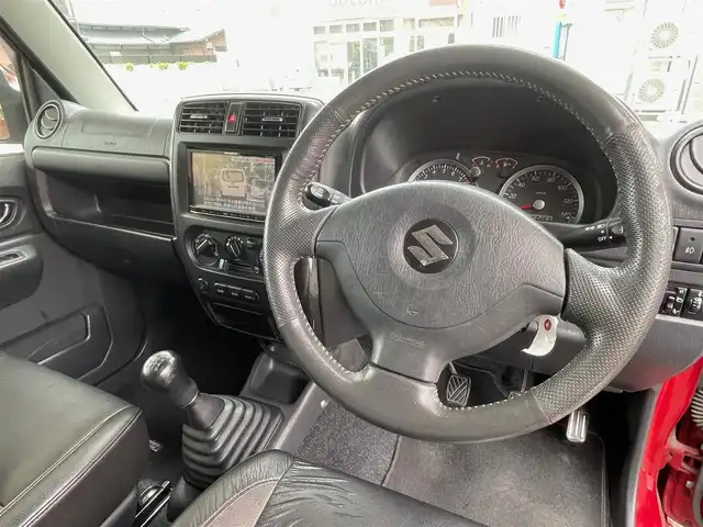 スズキ ジムニー クロスアドベンチャー XC 愛知県 2011(平23)年 15.3万km フェニックスレッドパール /当店買取/禁煙/1オーナー//社外ナビ/地デジ/CD//ETC//専用ハーフレザー/専用グリル//シートヒーター//タイヤハードケース//保証書/取説/キーレスキー