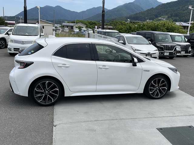 トヨタ カローラ スポーツ ハイブリッドG Z 山梨県 2019(平31)年 2.4万km スーパーホワイトⅡ 純正ナビ/TV/CD/DVD/BT/バックカメラ/ETC/衝突軽減装置　/ブラインドスポットモニター/クリアランスソナー/オートマチックハイビーム/デュアルエアコン/LEDヘッドライト/ドライブレコーダー/スマーキー/レーダークルーズコントロール/純正フロアマット/プッシュスタート