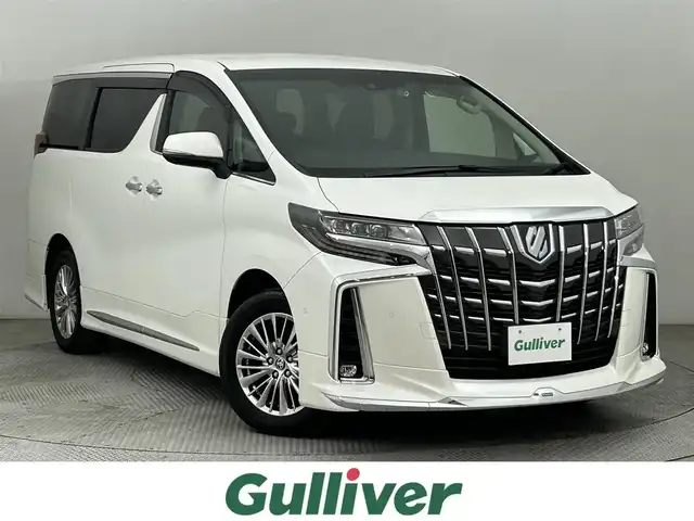 トヨタ アルファードハイブリット SR Cパッケージ 道央・札幌 2021(令3)年 2.3万km ホワイトパールクリスタルシャイン ・ワンオーナー/・禁煙車/・４WD/・モデリスタエアロ/・JBLサウンド/・純正10インチナビ/　CD/DVD/SD/BT/フルセグ/・純正フリップダウンモニター/・パノラミックビューモニター/・デジタルインナーミラー/・ビルトインETC2.0/・前後ドライブレコーダー/・トヨタセーフティセンス/・プリクラッシュセーフティ/・レーダークルーズコントロール/・レーンキープアシスト/・オートハイビーム/・クリアランスソナー/・BSM/・PKSB/・RSA/・RCTA/・nanoe/・レザーシート/・パワーシート/・エア/シートヒーター/・ステアリングヒーター/・両側パワースライドドア/・パワーバックドア/・3眼LEDヘッドライト/・フォグライト/・オートライト/・プッシュスタート/・スマートキー/・純正フロアマット/・ドアバイザー