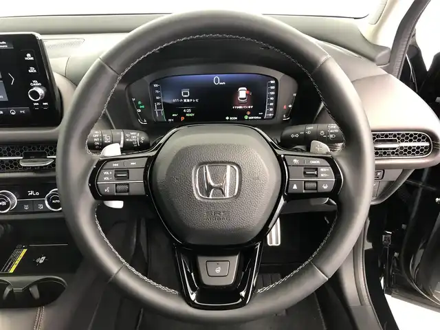 ホンダ ＺＲ－Ｖ ハイブリッド e:HEV Z 愛知県 2024(令6)年 1万km クリスタルブラックパール ワンオーナー/ホンダセンシング/　・衝突軽減ブレーキ/　・前後誤発進抑制/　・ブラインドスポットインフォメーション/　・追従クルーズコントロール/　・レーキープアシスト/　・トラフィックジャムアシスト/　・標識認識機能/　・歩行者事故低減ステアリング/　・パーキングセンサー/　・後退出庫サポート/　・オートハイビーム/　・アダプティブコーナリングライト/BOSEプレミアムサウンド/置くだけ充電/純正9インチナビ/　（Bluetooth/フルセグTV/AppleCar Play/）/全方位カメラ/ダウンヒルアシストコントロール/パワーテールゲート/レザーシート/パワーシート/シートヒーター/ステアリングヒーター/メモリシート/ETC2.0/ドライブレコーダー/パドルシフト/後席USB/純正18インチAW/オートホールド/ドアバイザー