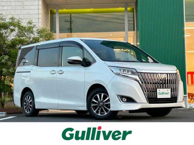 トヨタ エスクァイア Gi 岡山県 2018(平30)年 3.6万km ホワイトパールクリスタルシャイン 純正10インチナビ　NSZN-W68T/フルセグTV、Bluetooth、CD、DVD、AM、FM/純正12.1インチフリップダウンモニター/バックカメラ/前席シートヒーター/両側パワースライドドア/ビルトインETC/クルーズコントロール/純正前方ドライブレコーダー/シートバックテーブル/ロールサンシェード/LEDヘッドランプ/スーパーUVカット・IRカット機能ガラス/リアオートエアコン/トヨタセーフティセンス/・プリクラッシュセーフティ/・レーンディパーチャーアラート/・オートマチックハイビーム/先行車発進お知らせ機能/インテリジェントクリアランスソナー