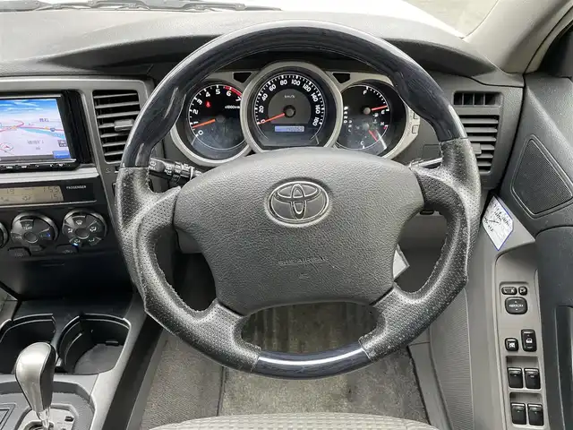 トヨタ ハイラックス サーフ SSR－X 岩手県 2009(平21)年 14万km シルバーM 社外メモリーナビ/バックカメラ/ウッドコンビステアリング/ヒッチメンバー/ドライブレコーダー/フォグライト/ETC/フロント/リアフォグライト/電動格納ミラー/ルーフレール