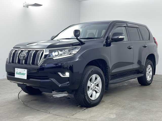 トヨタ ランドクルーザー プラド TX Lパッケージ 兵庫県 2021(令3)年 1.4万km ブラック ・社外9インチナビ（フルセグ・CD・DVD・BT・HDMI）/・サンルーフ/・トヨタセーフティセンス/・アダクティブクルーズコントロール/・レーンディパーチャーアラート/・プリクラッシュセーフティ/・オートマチックハイビーム/・レザーシート/・パワーシート/・シートヒーター/・シートベンチレーション/・3列目電動格納シート/・ETC/・前後ドライブレコーダー/・バックカメラ/・LEDオートライト/・LEDクリアランスランプ（デイライト機能付）/・ヘッドランプクリーナー/・VSC＆TRC（トラクションコントロール）/・ヒルスタートアシストコントロール/・電動センターデフロック/・緊急ブレーキシグナル/・純正17インチアルミホイール/・フロアマット/・スマートキー/・スペアキー/・プッシュスタート/・W＋サイドエアバック/・カーテンエアバック