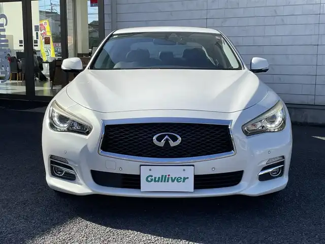 日産 スカイライン ハイブリッド 350GT Type P 大分県 2014(平26)年 6.9万km クリスタルホワイトパール ブラックレザーシート/メーカーメモリナビ 【フルセグ/DVD/BTオーディオ】/全方位カメラ/純正17インチアルミホイール/レーダークルーズコントロール/ドライブレコーダー/前後クリアランスソナー/前席パワーシート/ビルトインETC/LEDヘッドライト/LEDフォグランプ/オートライト/レザーステアリング/電動チルトステアリング/ステアリングリモコン/前席シートヒーター/横滑り防止装置/ウインカーミラー/ドアバイザー/フロアマット/電動格納ミラー/サイド＆Wエアバッグ/ABS/スマートキー×2/オールオートパワーウィンドウ/ナビ取説