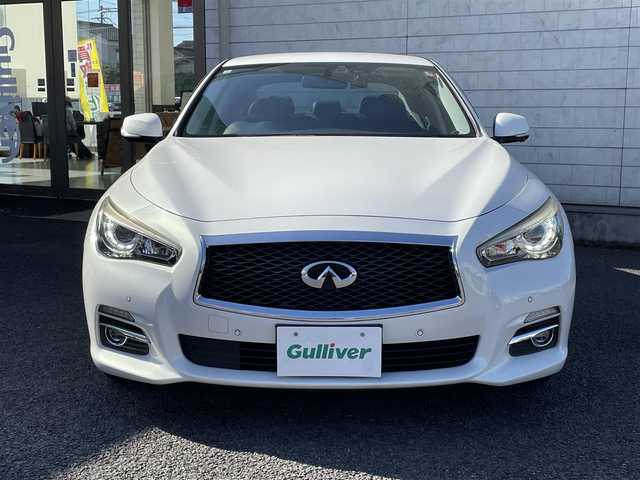 日産 スカイライン ハイブリッド 350GT Type P 大分県 2014(平26)年 6.9万km クリスタルホワイトパール ブラックレザーシート/メーカーメモリナビ 【フルセグ/DVD/BTオーディオ】/全方位カメラ/純正17インチアルミホイール/レーダークルーズコントロール/ドライブレコーダー/前後クリアランスソナー/前席パワーシート/ビルトインETC/LEDヘッドライト/LEDフォグランプ/オートライト/レザーステアリング/電動チルトステアリング/ステアリングリモコン/前席シートヒーター/横滑り防止装置/ウインカーミラー/ドアバイザー/フロアマット/電動格納ミラー/サイド＆Wエアバッグ/ABS/スマートキー×2/オールオートパワーウィンドウ/ナビ取説