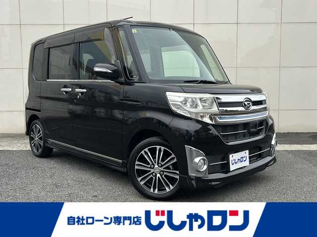 ダイハツ タント カスタム RS スマセレSA&SN 埼玉県 2014(平26)年 6.5万km ブラックマイカメタリック (株)IDOMが運営する【じしゃロン熊谷店】の自社ローン専用車両になりますこちらは現金またはオートローンご利用時の価格です。自社ローンご希望の方は別途その旨お申付け下さい/スマートアシスト/純正メモリーナビ/　CD/DVD/ワンセグ/Bluetooth/AUX/USB/HDMI/革巻きステアリング/ステアリングスイッチ/スマートキー&プッシュスタート/アイドリングストップ/ETC/スペアキー有/純正合皮シートカバー/バックカメラ/両側パワースライドドア/KENWOOD製ツィーター（KFC-ST01）/セルスター製レーダー探知機（VA-230E）