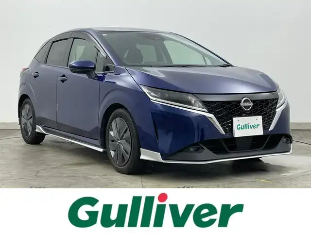 日産 ノート X 岡山県 2021(令3)年 2.4万km オーロラフレアブルーパール 社外メモリーナビ/【AM/FM/CD/DVD/Bluetooth/フルセグTV】/型番:CN-RE07WD/純正エアロ/前席シートヒーター/ステアリングヒーター/ETC/コーナーセンサー（前後）/バックカメラ/衝突軽減ブレーキシステム/ステアリングスイッチ/スマートキー/純正フロアマット/LEDヘッドライト/LEDフォグランプ/オートハイビーム