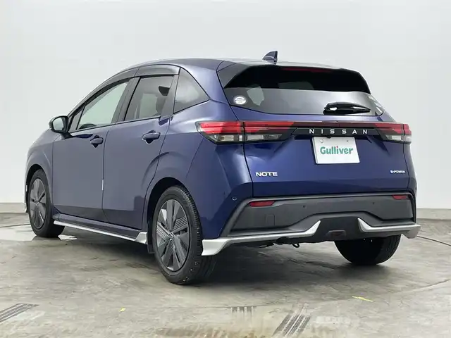 日産 ノート X 岡山県 2021(令3)年 2.4万km オーロラフレアブルーパール 社外メモリーナビ/【AM/FM/CD/DVD/Bluetooth/フルセグTV】/型番:CN-RE07WD/純正エアロ/前席シートヒーター/ステアリングヒーター/ETC/コーナーセンサー（前後）/バックカメラ/衝突軽減ブレーキシステム/ステアリングスイッチ/スマートキー/純正フロアマット/LEDヘッドライト/LEDフォグランプ/オートハイビーム