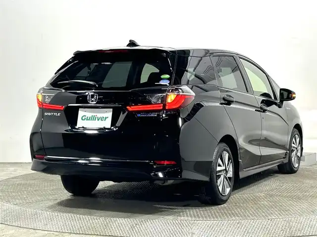 ホンダ シャトル ハイブリッド X ホンダセンシング 大阪府 2020(令2)年 3.7万km クリスタルブラックパール 純正ナビ(フルセグ/DVD再生/Bluetooth) バックカメラ ETC ハーフレザー シートヒーター 衝突軽減 レーダークルコン レーンアシスト ドラレコ スマートキー ワンオーナー