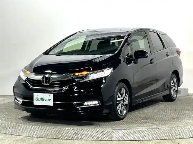 ホンダ シャトル ハイブリッド X ホンダセンシング 大阪府 2020(令2)年 3.7万km クリスタルブラックパール 純正ナビ(フルセグ/DVD再生/Bluetooth) バックカメラ ETC ハーフレザー シートヒーター 衝突軽減 レーダークルコン レーンアシスト ドラレコ スマートキー ワンオーナー