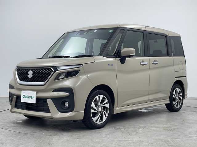 スズキ ソリオ バンディット HV SV 三重県 2023(令5)年 1.6万km キャラバンアイボリーPM 禁煙車/純正ナビ　/全方位カメラ　/両側電動ドア　/スズキセーフティーサポート　/衝突軽減　/追従式クルーズコントロール　/パドルシフト　/シートヒーター　/コーナーセンサー　/ドラレコ前後　/純正アルミ　/ＬＥＤヘッドライト/スタッドレス積込