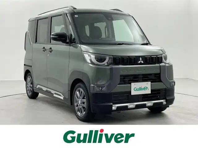 三菱 デリカミニ T プレミアム リミテッド ED 福井県 2025(令7)年 0.1万km未満 緑 届済み未使用車/純正ディスプレイオーディオ/【AM/FM/Bluetooth/HDMI/USB】/全方位カメラ/両側パワースライドドア/シートヒーター/ハンドルヒーター/衝突軽減ブレーキ/クルーズコントロール/オートライト/LEDヘッドライド/LEDフォグライト/ヘッドライドレベライザー/プッシュスタート/スマートキー/スペアキー/取扱説明書/新車時保証書/カラーコード：X42F29/アッシュグリーンメタリック × ブラックマイカ