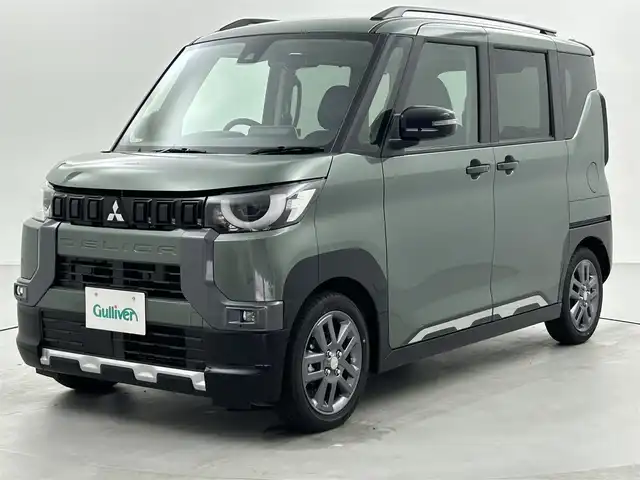 三菱 デリカミニ T プレミアム リミテッド ED 福井県 2025(令7)年 0.1万km未満 緑 届済み未使用車/純正ディスプレイオーディオ/【AM/FM/Bluetooth/HDMI/USB】/全方位カメラ/両側パワースライドドア/シートヒーター/ハンドルヒーター/衝突軽減ブレーキ/クルーズコントロール/オートライト/LEDヘッドライド/LEDフォグライト/ヘッドライドレベライザー/プッシュスタート/スマートキー/スペアキー/取扱説明書/新車時保証書/カラーコード：X42F29/アッシュグリーンメタリック × ブラックマイカ