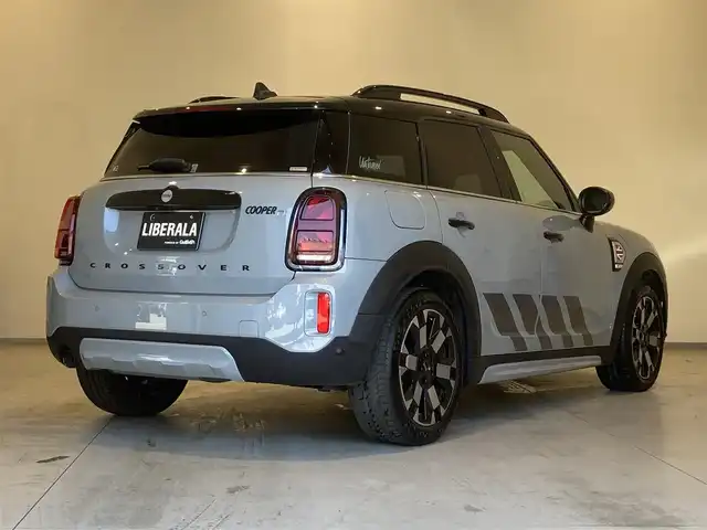 ＭＩＮＩ ＢＭＷ ミニ クロスオーバー クーパー D アンテイムドED 熊本県 2023(令5)年 1.9万km グレーⅡ ・スマートキー/・プッシュスタート/・インテリジェントセーフティ/・PDC自動起動/・パーキングアシスト/・クルーズコントロール(追従式)/・茶革シート/・前席シートヒーター /・純正メモリナビ/　【Bluetooth・USB・AppleCarPlay】/・バックカメラ/・ETC/・ドライブレコーダー(前後録画)/・パワーバックドア/・LEDヘッドランプ/・LEDフォグランプ/・UKテール/・純正マット