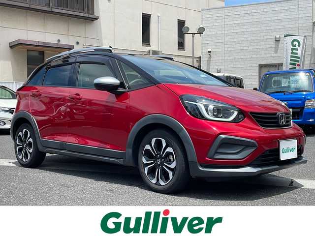 ホンダ フィット クロスター 岡山県 2020(令2)年 5万km プレミアムクリスタルレッドM 登録時走行距離49901キロ/純正9インチプレミアムインターナビ/AM/FM/Bluetooth/TV/SD/CD/DVD/ホンダセンシング/・衝突軽減ブレーキ/・アダプティブクルーズコントロール/・車線逸脱警報/コーナーセンサー/バックカメラ/純正16インチAW/前ドライブレコーダー/純正フロアマット/プッシュスタート/スマートキー/ETC