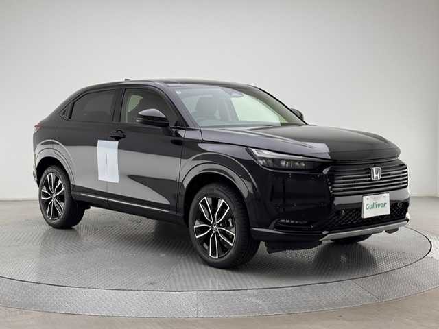 ホンダ ヴェゼル ハイブリッド e:HEV Z 兵庫県 2025(令7)年 0.1千km クリスタルブラックパール 登録済み未使用車/純正メモリナビ/（フルセグ/Bluetooth/AppleCarPlay/AndroidAuto）/純正ディスプレイオーディオ/バックカメラ/ビルトインETC2.0/ワイヤレス充電/パドルシフト/パワーバックドア/ハーフレザーシート/LEDヘッドライト/LEDフォグ/純正18インチアルミホイール/コーナーセンサー/ACC/PCS/BSM/LKA