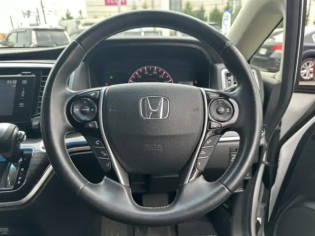 ホンダ オデッセイ アブソルート 道北・旭川 2015(平27)年 14万km ホワイトオーキッドパール (株)IDOMが運営する【じしゃロン旭川店】の自社ローン専用車両になります。こちらは現金またはオートローンご利用時の価格です。自社ローンご希望の方は別途その旨お申付け下さい/　/・純正ナビ(CD/DVD/BT/フルセグ)/・バックカメラ/・ETC/・レーダーブレーキ/・クルーズコントロール/・パドルシフト/・ステアリングリモコン/・両側パワースライドドア/・プッシュスタート/・スマートキー1個/・フォグランプ