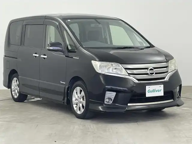日産 セレナ ハイウェイスター S HV エアロ 大分県 2013(平25)年 8.7万km スーパーブラック 純正ナビ　型式MC312D-W/　AM/FM/CD/DVD/BT/　USB入力端子/　フルセグTV/バックカメラ/後席モニター　型式PCX-R3300/両側パワースライドドア/クルーズコントロール/ETC/プッシュスタート/アイドリングストップ/横滑り防止装置/電動格納ミラー/純正フロアマット/オートライト/HIDヘッドライト/フォグランプ/純正16インチアルミホイール