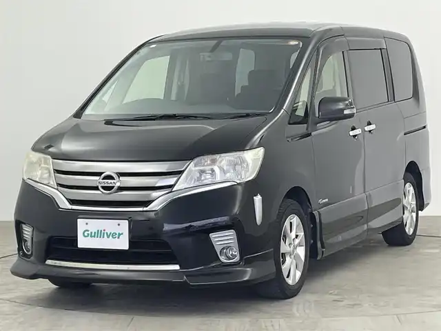 日産 セレナ ハイウェイスター S HV エアロ 大分県 2013(平25)年 8.7万km スーパーブラック 純正ナビ　型式MC312D-W/　AM/FM/CD/DVD/BT/　USB入力端子/　フルセグTV/バックカメラ/後席モニター　型式PCX-R3300/両側パワースライドドア/クルーズコントロール/ETC/プッシュスタート/アイドリングストップ/横滑り防止装置/電動格納ミラー/純正フロアマット/オートライト/HIDヘッドライト/フォグランプ/純正16インチアルミホイール