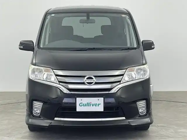日産 セレナ ハイウェイスター S HV エアロ 大分県 2013(平25)年 8.7万km スーパーブラック 純正ナビ　型式MC312D-W/　AM/FM/CD/DVD/BT/　USB入力端子/　フルセグTV/バックカメラ/後席モニター　型式PCX-R3300/両側パワースライドドア/クルーズコントロール/ETC/プッシュスタート/アイドリングストップ/横滑り防止装置/電動格納ミラー/純正フロアマット/オートライト/HIDヘッドライト/フォグランプ/純正16インチアルミホイール