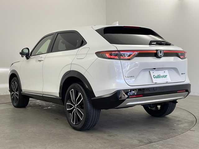 ホンダ ヴェゼル ハイブリッド e:HEV Z 兵庫県 2021(令3)年 5.1万km プラチナホワイトパール ・純正ナビ＆BT＆CD/・バックカメラ/・ホンダセンシング/・路外逸脱抑制機能/・踏み間違い衝突軽減システム/・CMBS/・標識認識機能/・先行車発進お知らせ/・レーダークルーズコントロール/・前後コーナーセンサー/・ブラインドスポットインフォメーション/・フロントワイパーデザイアー/・ドアミラーヒーター/・パドルシフト/・前席シートヒーター/・コンフォートビュー/・ステアリングヒーター/・LEDライト/・ハーフレザーシート/・フォグランプ/・オートライト/・オートマチックハイビーム/・スマートキー/・プッシュスタート/・パワーバックドア