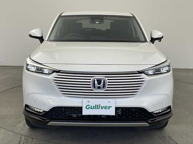 ホンダ ヴェゼル ハイブリッド e:HEV Z 兵庫県 2021(令3)年 5.1万km プラチナホワイトパール ・純正ナビ＆BT＆CD/・バックカメラ/・ホンダセンシング/・路外逸脱抑制機能/・踏み間違い衝突軽減システム/・CMBS/・標識認識機能/・先行車発進お知らせ/・レーダークルーズコントロール/・前後コーナーセンサー/・ブラインドスポットインフォメーション/・フロントワイパーデザイアー/・ドアミラーヒーター/・パドルシフト/・前席シートヒーター/・コンフォートビュー/・ステアリングヒーター/・LEDライト/・ハーフレザーシート/・フォグランプ/・オートライト/・オートマチックハイビーム/・スマートキー/・プッシュスタート/・パワーバックドア
