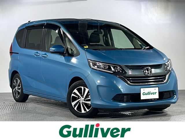 ホンダ フリード ハイブリット EX 沖縄県 2019(平31)年 4.5万km ブルーホライゾンM 県外仕入/禁煙車/6人乗り/純正SDナビ/DVD/CD/BT/フルセグ/バックカメラ/ETC/ドライブレコーダー/ホンダセンシング/衝突軽減ブレーキ/レーンキープアシスト/アダプティブクルーズコントロール/コーナーセンサー/横滑り防止装置/両側パワースライドドア/ハーフレザーシート/前席シートヒーター/LEDヘッドライト/オートライト/純正15インチAW/純正フロアマット/プッシュスタート/スマートキー/保証書