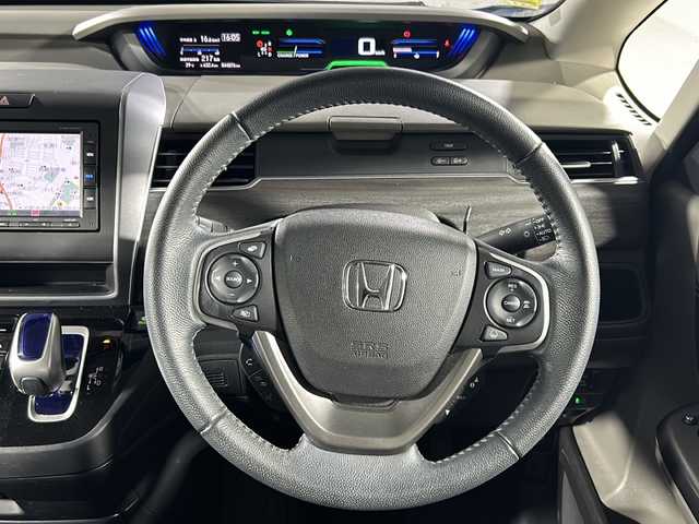 ホンダ フリード ハイブリット EX 沖縄県 2019(平31)年 4.5万km ブルーホライゾンM 県外仕入/禁煙車/6人乗り/純正SDナビ/DVD/CD/BT/フルセグ/バックカメラ/ETC/ドライブレコーダー/ホンダセンシング/衝突軽減ブレーキ/レーンキープアシスト/アダプティブクルーズコントロール/コーナーセンサー/横滑り防止装置/両側パワースライドドア/ハーフレザーシート/前席シートヒーター/LEDヘッドライト/オートライト/純正15インチAW/純正フロアマット/プッシュスタート/スマートキー/保証書