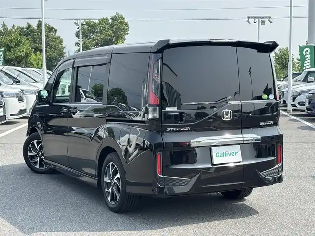 ホンダ ステップワゴン スパーダ ホンダセンシング 奈良県 2018(平30)年 5.3万km プレミアムスパークルブラックパール １０型フローティングナビ　/(BT/HDMI/DVD/CD)/バックカメラ　/フルセグＴＶ　/両側パワースライドドア　/黒革調シートカバー　/ＥＴＣ　/パドルシフト　/純正ゴムフロアマット /エンジンスターター /両側パワースライドドア