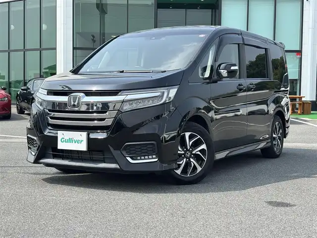 ホンダ ステップワゴン スパーダ ホンダセンシング 奈良県 2018(平30)年 5.3万km プレミアムスパークルブラックパール １０型フローティングナビ　/(BT/HDMI/DVD/CD)/バックカメラ　/フルセグＴＶ　/両側パワースライドドア　/黒革調シートカバー　/ＥＴＣ　/パドルシフト　/純正ゴムフロアマット /エンジンスターター /両側パワースライドドア
