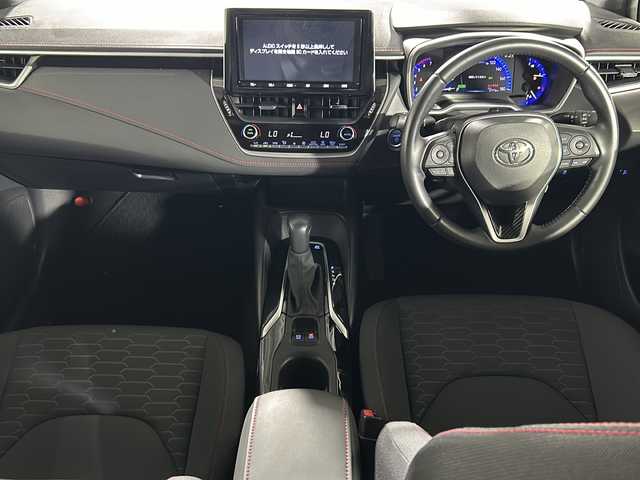 トヨタ カローラ スポーツ ハイブリッドG Z 沖縄県 2018(平30)年 5.8万km パール 県外仕入れ/禁煙車/純正9インチナビ[NSZT-Y68T]/（フルセグTV Bluetooth CD DVD）/バックカメラ/ビルトインETC/レーダークルーズコントロール/ステアリングスイッチ/ドライブレコーダー/電動パーキングブレーキ/トヨタセーフティセンス/・レーントレーシングアシスト/・プリクラッシュセーフティ/・ブラインドスポットモニター/・オートマチックハイビーム/・クリアランスソナー