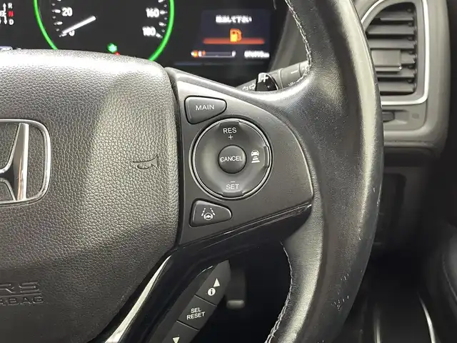 ホンダ ヴェゼル ハイブリッド Z ホンダセンシング 熊本県 2017(平29)年 7.7万km クリスタルブラックパール 禁煙車/純正８型ナビVXM-165VFEi（フルセグTV・AM・FM・Bluetooth・USB）/アルパインフリップダウンモニター/バックカメラ/レーダークルーズコントロール/ETC/前席シートヒーター/ホンダセンシング/衝突軽減ブレーキ/レーンキープアシスト/横滑り防止/ダウンヒルアシスト/ハーフレザーシート/社外フロアマット/純正17インチAW/オートライト/LEDオートライト/フォグランプ/ルーフレール/スマートキー/プッシュスタート