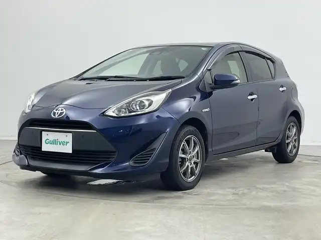 トヨタ アクア S スタイルブラック 新潟県 2018(平30)年 6万km ダークブルーマイカ 社外メモリナビ（Bluetooth・USB・CD・DVD）/フルセグ　/バックカメラ　/前方ドライブレコーダー/レーンキープアシスト　/前後コーナーセンサー　/クルーズコントロール/パーキングサポートブレーキ　/衝突被害軽減システム/ステアリングスイッチ/社外１５インチアルミホイール/純正フロアマット/ハロゲンオートライト　/オートマチックハイビーム　/保証書/取扱説明書/スマートキー/スペアキー