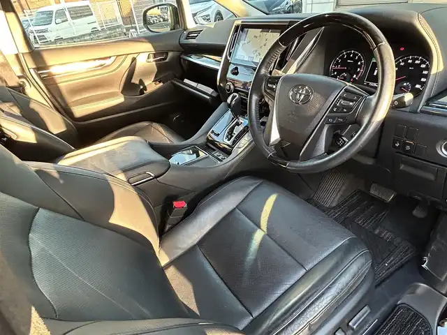 トヨタ ヴェルファイア Z Gエディション 福岡県 2015(平27)年 7.4万km ブラック モデリスタエアロ(リア)/フロントガーニッシュ/ツインムーンルーフ/純正10.1インチフリップダウンモニター/JBLプレミアムサウンド/純正9インチメーカーナビ/(AM/FM/CD/DVD/Bluetooth/フルセグTV)/全方位カメラ/バック/フロント/サイドカメラ/運転支援/・プリクラッシュセーフティシステム/・クリアランスソナー/・レーダークルーズコントロール/横滑り防止/純正18インチアルミホール/両側パワースライドドア/パワーバックドア/純正LEDスタイリッシュビーム(フロントガーニッシュ用)/黒レザーシート/レーダー探知機【ASSURA AR-W51GA】/ビルトインETC/純正インテリアイルミネーション/純正スカッフイルミネーション/ステアリングヒーター/革巻きステアリング/ステアリングスイッチ/パワーシート(D/N)/シートヒーター(D/N)/シートメモリー(D)/オットマン(N/セカンドシート)/後席電動サンシェード/純正フロアマット/ナノイー/ドアバイザー/ブレーキホールド/プッシュスタート/USBポート/スペアキー×1/100V電源/ISOFIX/保証書/取説、ナビ取説