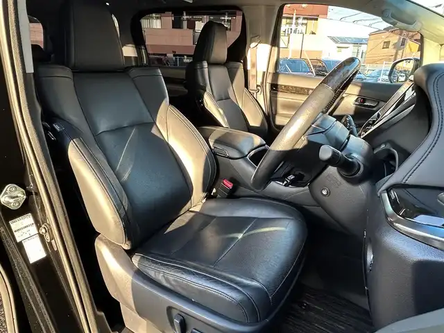 トヨタ ヴェルファイア Z Gエディション 福岡県 2015(平27)年 7.4万km ブラック モデリスタエアロ(リア)/フロントガーニッシュ/ツインムーンルーフ/純正10.1インチフリップダウンモニター/JBLプレミアムサウンド/純正9インチメーカーナビ/(AM/FM/CD/DVD/Bluetooth/フルセグTV)/全方位カメラ/バック/フロント/サイドカメラ/運転支援/・プリクラッシュセーフティシステム/・クリアランスソナー/・レーダークルーズコントロール/横滑り防止/純正18インチアルミホール/両側パワースライドドア/パワーバックドア/純正LEDスタイリッシュビーム(フロントガーニッシュ用)/黒レザーシート/レーダー探知機【ASSURA AR-W51GA】/ビルトインETC/純正インテリアイルミネーション/純正スカッフイルミネーション/ステアリングヒーター/革巻きステアリング/ステアリングスイッチ/パワーシート(D/N)/シートヒーター(D/N)/シートメモリー(D)/オットマン(N/セカンドシート)/後席電動サンシェード/純正フロアマット/ナノイー/ドアバイザー/ブレーキホールド/プッシュスタート/USBポート/スペアキー×1/100V電源/ISOFIX/保証書/取説、ナビ取説