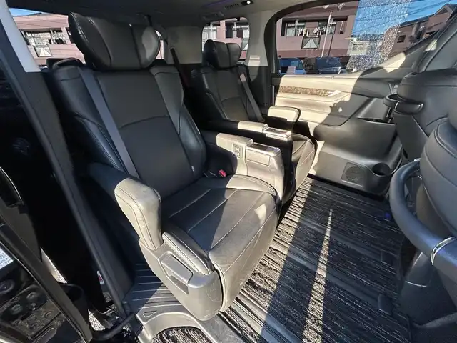 トヨタ ヴェルファイア Z Gエディション 福岡県 2015(平27)年 7.4万km ブラック モデリスタエアロ(リア)/フロントガーニッシュ/ツインムーンルーフ/純正10.1インチフリップダウンモニター/JBLプレミアムサウンド/純正9インチメーカーナビ/(AM/FM/CD/DVD/Bluetooth/フルセグTV)/全方位カメラ/バック/フロント/サイドカメラ/運転支援/・プリクラッシュセーフティシステム/・クリアランスソナー/・レーダークルーズコントロール/横滑り防止/純正18インチアルミホール/両側パワースライドドア/パワーバックドア/純正LEDスタイリッシュビーム(フロントガーニッシュ用)/黒レザーシート/レーダー探知機【ASSURA AR-W51GA】/ビルトインETC/純正インテリアイルミネーション/純正スカッフイルミネーション/ステアリングヒーター/革巻きステアリング/ステアリングスイッチ/パワーシート(D/N)/シートヒーター(D/N)/シートメモリー(D)/オットマン(N/セカンドシート)/後席電動サンシェード/純正フロアマット/ナノイー/ドアバイザー/ブレーキホールド/プッシュスタート/USBポート/スペアキー×1/100V電源/ISOFIX/保証書/取説、ナビ取説