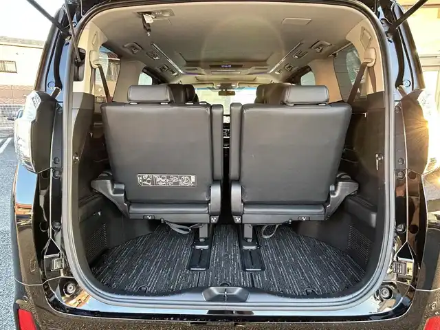 トヨタ ヴェルファイア Z Gエディション 福岡県 2015(平27)年 7.4万km ブラック モデリスタエアロ(リア)/フロントガーニッシュ/ツインムーンルーフ/純正10.1インチフリップダウンモニター/JBLプレミアムサウンド/純正9インチメーカーナビ/(AM/FM/CD/DVD/Bluetooth/フルセグTV)/全方位カメラ/バック/フロント/サイドカメラ/運転支援/・プリクラッシュセーフティシステム/・クリアランスソナー/・レーダークルーズコントロール/横滑り防止/純正18インチアルミホール/両側パワースライドドア/パワーバックドア/純正LEDスタイリッシュビーム(フロントガーニッシュ用)/黒レザーシート/レーダー探知機【ASSURA AR-W51GA】/ビルトインETC/純正インテリアイルミネーション/純正スカッフイルミネーション/ステアリングヒーター/革巻きステアリング/ステアリングスイッチ/パワーシート(D/N)/シートヒーター(D/N)/シートメモリー(D)/オットマン(N/セカンドシート)/後席電動サンシェード/純正フロアマット/ナノイー/ドアバイザー/ブレーキホールド/プッシュスタート/USBポート/スペアキー×1/100V電源/ISOFIX/保証書/取説、ナビ取説