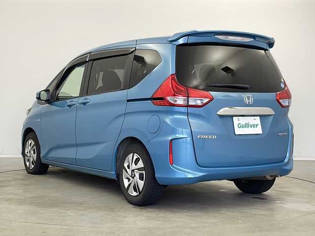 ホンダ フリード ハイブリット G ホンダセンシング 新潟県 2018(平30)年 7.6万km ブルーホライゾンM 純正SDナビ/(フルセグTV/CD/DVD/Bluetooth)/バックモニター/ホンダセンシング/レーダークルーズコントロール/両側パワースライドドア/ビルドインETC/アイドリングストップ/純正LEDヘッドライト/純正フロアマット/ウッドパネル/スペアキー/プッシュスタート