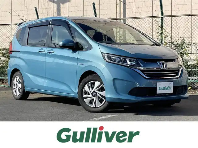 ホンダ フリード ハイブリット G ホンダセンシング 東京都 2018(平30)年 7.6万km ブルーホライゾンM 純正SDナビ/(フルセグTV/CD/DVD/Bluetooth)/バックモニター/ホンダセンシング/レーダークルーズコントロール/両側パワースライドドア/ビルドインETC/アイドリングストップ/純正LEDヘッドライト/純正フロアマット/ウッドパネル/スペアキー/プッシュスタート