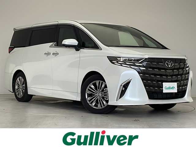 トヨタ アルファード Z 愛知県 2024(令6)年 0.8万km プラチナホワイトパールマイカ 衝突軽減システム/純正14型ディズプレイオーディオ　ナビあり/フリップダウンモニター/三眼LEDヘッドライト/全方位カメラ/両側パワースライドドア/ガラスルーフ/レーダークルーズコントロール/シートヒーター/エアシート/フルセグ/Bluetooth/バックカメラ/電動リアゲート/パワーシート/コーナーセンサー/純正アルミホイール/ETC2.0/ブラインドスポットモニター/ステアリングヒーター/インテリジェントミラー/リアオートエアコン/オートマチックハイビーム/置くだけ充電機/ドライブレコーダー/ステアリングスイッチ/スマートキー/プッシュスタート