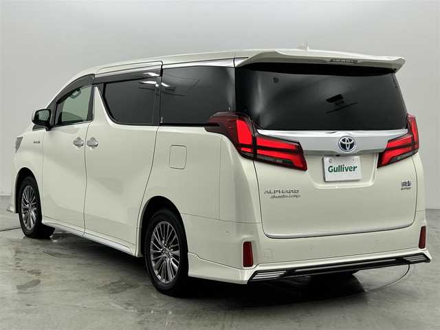 トヨタ アルファードハイブリット エグゼクティブ ラウンジ S 福岡県 2020(令2)年 3.5万km ラグジュアリーホワイトパールクリスタルシャインガラスフレーク サンルーフ　/フリップダウンモニター　/純正１０．５型ナビ　/全方位カメラ　/ＪＢＬサウンドシステム　/デジタルルームミラー　/レーダークルーズコントロール　/コーナーセンサー/衝突軽減ブレーキ　/レーンキープ　/ＢＳＭ　/ＰＫＳＢ/RCTA　/両側電動スライドドア/パワーシート/シートベンチレーション／ヒーター/ステアリングヒーター/ビルトインETC２．０/前後ドライブレコーダー