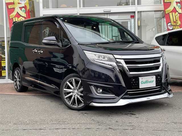 トヨタ エスクァイア Gi 道央・札幌 2019(令1)年 3.6万km ブラック ４WD/純正SDナビ(AM/FM/CD/DVD/BT/SD)/フルセグテレビ(走行中視聴可能)/バックカメラ/アイドリングストップ/ウィンカーミラー/キャプテンシート/クルーズコントロール/ステアリングスイッチ/ドアバイザー/プッシュスタート/両側パワースライドドア/ビルトインETC/前席シートヒーター/レーンキープアシスト/横滑り防止装置/盗難防止装置/オートライト/フォグランプ/防眩ミラー/積込冬タイヤ/　　（純正AW/195/６５R15 19年製溝7ｍｍ）/積込エアロ（ＴＲＤ）