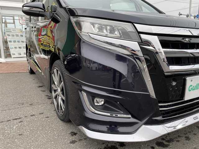 トヨタ エスクァイア Gi 道央・札幌 2019(令1)年 3.6万km ブラック ４WD/純正SDナビ(AM/FM/CD/DVD/BT/SD)/フルセグテレビ(走行中視聴可能)/バックカメラ/アイドリングストップ/ウィンカーミラー/キャプテンシート/クルーズコントロール/ステアリングスイッチ/ドアバイザー/プッシュスタート/両側パワースライドドア/ビルトインETC/前席シートヒーター/レーンキープアシスト/横滑り防止装置/盗難防止装置/オートライト/フォグランプ/防眩ミラー/積込冬タイヤ/　　（純正AW/195/６５R15 19年製溝7ｍｍ）/積込エアロ（ＴＲＤ）