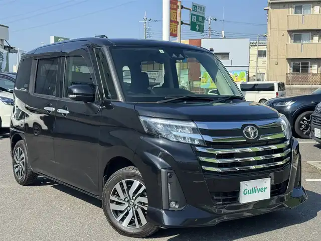 トヨタ ルーミー カスタムG 千葉県 2021(令3)年 3.7万km ブラックマイカメタリック 9インチ純正ディスプレイオーディオ/・ラジオ/・フルセグTV/・Bluetooth/・USB/・Apple Car Play/・Android Auto/主要装備/・クルーズコントロール/・コーナーセンサー/・両側パワースライドドア/・スマートアシスト/・ＬＥＤヘッドライト/・横滑り防止装置/・アイドリングストップ/・オートライト/・オートハイビーム/・純正アルミホイール