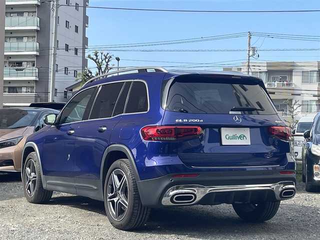 メルセデス・ベンツ Ｍ・ベンツ ＧＬＢ２００ｄ 4マチック AMGライン 東京都 2021(令3)年 1.4万km 青 4WD/ターボ/純正HDDナビ/ (フルセグTV/Bluetooth/USB)/全方位カメラ/ビルトインETC2.0/前後純正ドライブレコーダー/ハーフレザーシート/前席メモリ機能付きパワーシート/前席シートヒーター/パワーバックドア【フットトランクオープナー】/レーダーセーフティーパッケージ/・アクティブディスタンスアシストディストロニック(全自動再発進機能付)/・アクティブステアリングアシスト/・アクティブレーンチェンジングアシスト/・アクティブブレーキアシスト(歩行者/飛び出し検知機能付)/・PRE-SAFE/・緊急回避補助システム/・渋滞時緊急ブレーキ機能/・アクティブブラインドスポットアシスト/・アクティブレーンキーピングアシスト/・リアCPA(被害軽減ブレーキ付後方衝突警告システム)/・トラフィックサインアシスト/オートマチックハイビーム/ダウンヒルアシストコントロール/横滑り防止装置/純正19インチアルミホイール/スマートキー/純正LEDヘッドライト/パドルシフト/カーテンエアバック/スペアキー1本/保証書/取扱説明書