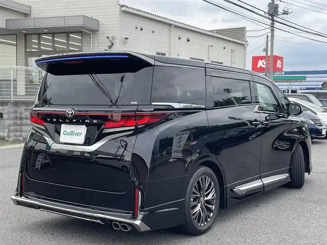トヨタ ヴェルファイア Z プレミア 群馬県 2024(令6)年 0.4万km ブラック ワンオーナー/全席パワーシート/全席シートヒーター/全席エアシート/純正ディスプレイオーディオ/ヘッドアップディスプレイ/シートメモリー/キャプテンシート/純正フリップダウンモニター/純正ビルトインETC2.0/ガラスルーフ/オットマン/デジタルインナーミラー/モデリスタエアロ/ユニバーサルステップ/前後ドライブレコーダー/ウッドコンビステアリング/置くだけ充電/ドアバイザー/電動格納ミラー/プッシュスタート/スマートキー×２/LEDヘッドライト