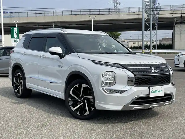 三菱 アウトランダー ＰＨＥＶ G 石川県 2022(令4)年 6.5万km ホワイトダイヤモンド 4WD/ワンオーナー/純正ナビ/フルセグTV/マイパイロット/LEDヘッドライト/レーダーブレーキ/ハーフレザーシート/シートヒーター/パワーバックドア/純正20インチAW/充電ケーブル/スマートキー/100V電源/保証書
